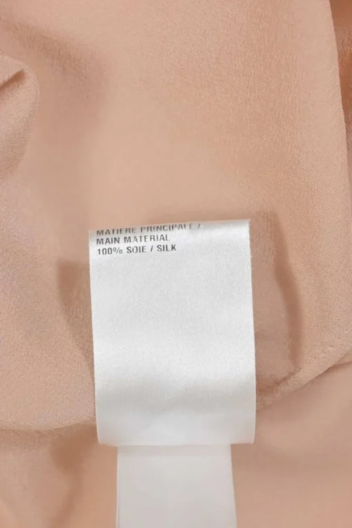 Blush silk spread collar button-front shirt with scalloped placket