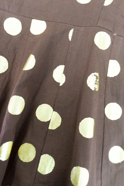 Brown foiled polka-dot print a line cocktail dress with colourful fabric covered pom-pom back tie and ribbon trim along sweep