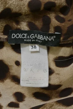 Brown leopard print half-button pullover sleeveless top with ruffled neckline
