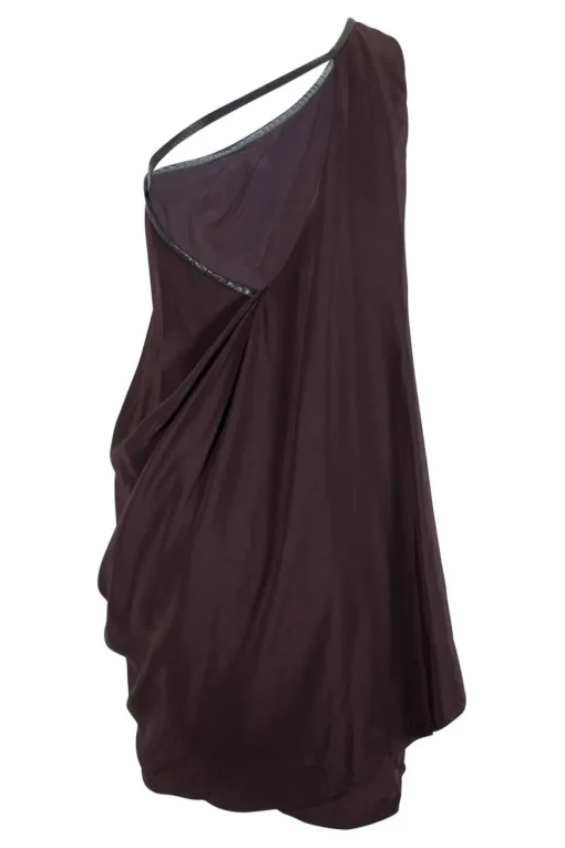 Brown sleeveless single shoulder silk mini dress with overlapping front and leather binding on the neckline and armhole