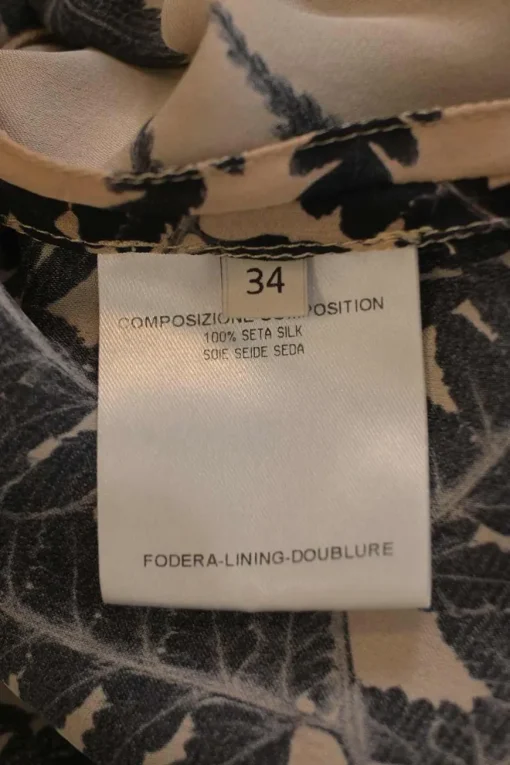 Camel and black silk palm leaf print pussy-bow swing-style shift dress with raglan bishop sleeves