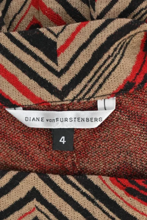 Camel and red wool-blend paneled chevron stripe jacquard knit flounce midi skirt
