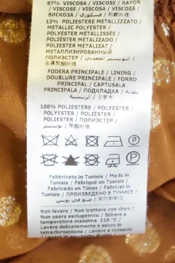 Caramel viscose-polyester blend metallic dot georgette tie neck drop waist pullover tiered shift dress