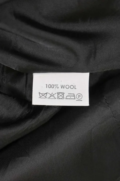 Charcoal draped bias-cut stripe wool sleeveless sheath dress with cascade drape hip detail