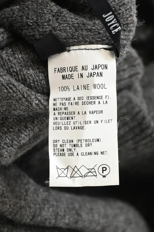 Charcoal draped wool roll jersey stand collar button-front dolman sleeve cardigan with argyle pointelle knit inserts