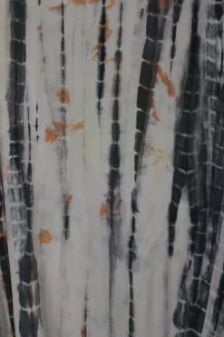 Charcoal silk tie-dye print short sleeve pullover top with drawstring hem and drop shoulders