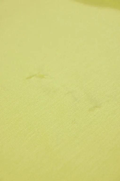 Chartreuse lace-trimmed Tencel-blend jersey knit slip dress with tuck-pleat hip detail