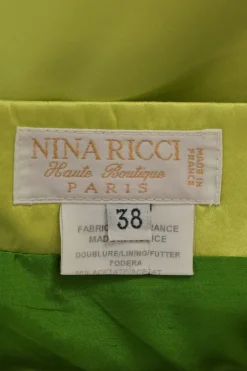 Chartreuse silk pull-on knee-length pencil skirt with rear bow-embellished plissé godet insert