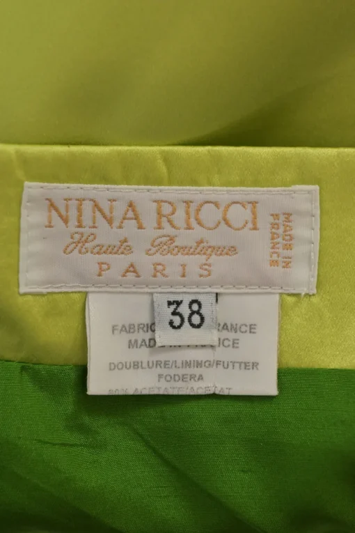 Chartreuse silk pull-on knee-length pencil skirt with rear bow-embellished plissé godet insert