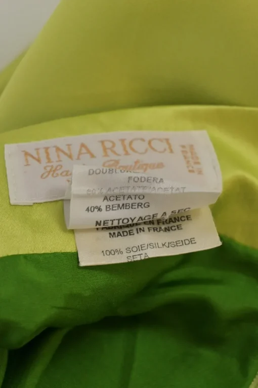 Chartreuse silk pull-on knee-length pencil skirt with rear bow-embellished plissé godet insert