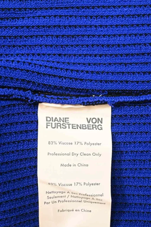 Cobalt blue and black viscose-blend rib knit wrap-front long sleeve top with scalloped edges