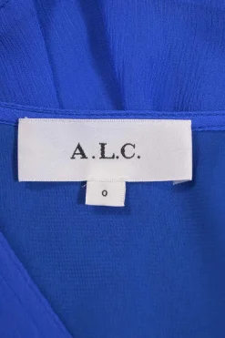 Cobalt blue silk plunge neck long sleeve open-back mini dress with side cutouts