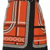 Coral and black silk chainlink foulard print apron-style pleated mini skirt with horsebit-trimmed waist