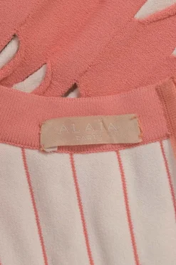 Coral pink fully-fashioned slash knit plunge neck skater dress