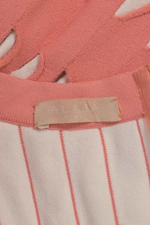 Coral pink fully-fashioned slash knit plunge neck skater dress