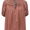 Coral polyester chalis tie-neck keyhole front short sleeve peasant blouse with ruffle trim detailing