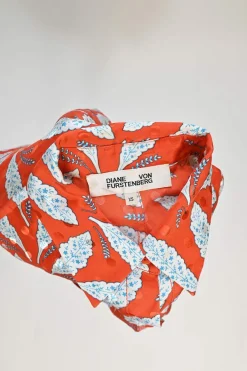 Coral red and blue silk leaf print belted short sleeve shirt dress with point collar and chest patch pockets