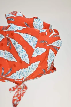 Coral red and blue silk leaf print belted short sleeve shirt dress with point collar and chest patch pockets