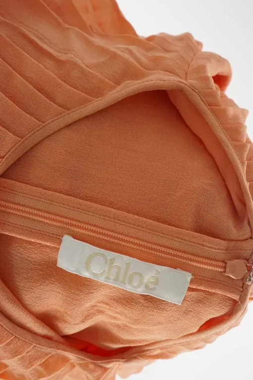 Coral silk crêpe slip-on belted plissé sleeveless dress
