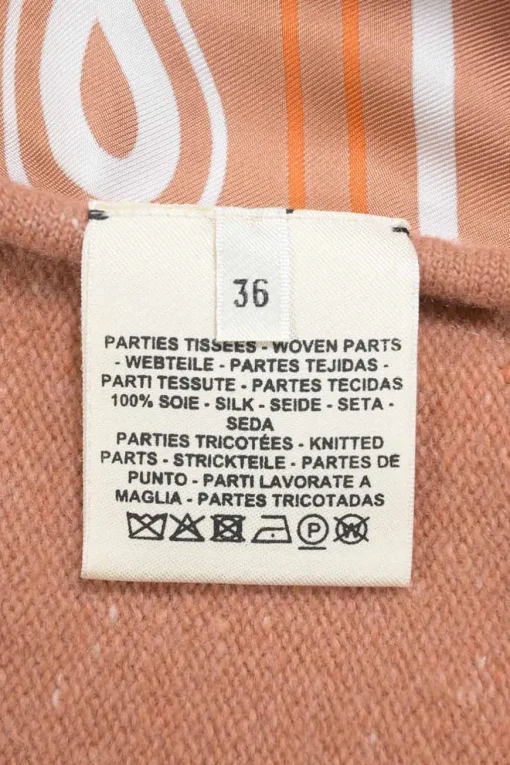 Coral wool-blend 'Brides De Gala' Twillaine short sleeve pullover knit top featuring original artwork by Hugo Grygkar