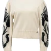 Cream and black cashmere-silk blend crewneck intarsia knit sweater featuring floral Coco Mark sleeve motif