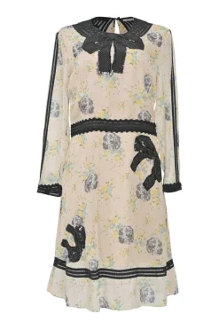 Cream and black cupro bow-embellished floral print long sleeve mini dress with cutout edge trim detailing