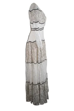 Cream and black long sleeve lace maxi dress with open back and back tie straps