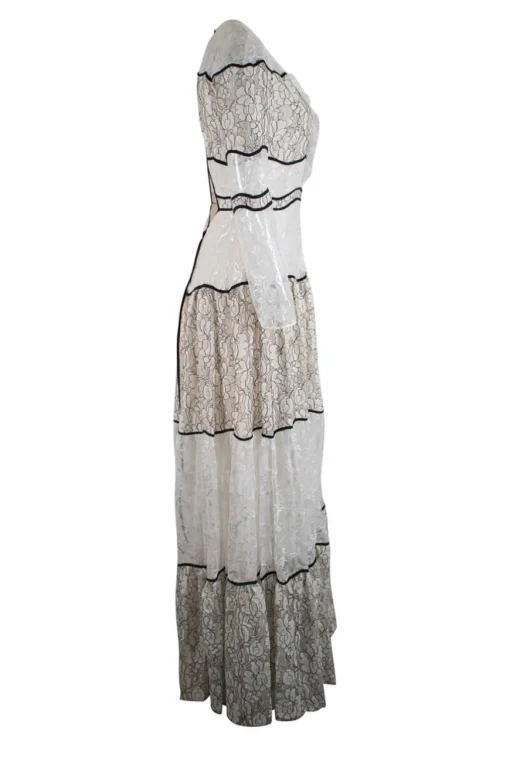 Cream and black long sleeve lace maxi dress with open back and back tie straps