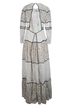 Cream and black long sleeve lace maxi dress with open back and back tie straps