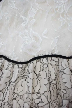 Cream and black long sleeve lace maxi dress with open back and back tie straps