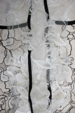 Cream and black long sleeve lace maxi dress with open back and back tie straps