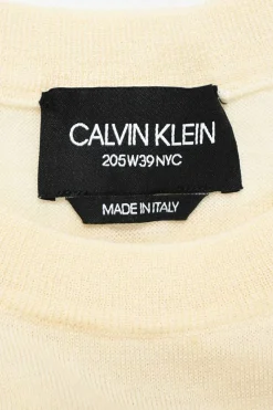 Cream and yellow convertible crewneck sweater with detachable sleeves