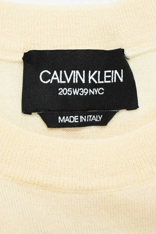 Cream and yellow convertible crewneck sweater with detachable sleeves