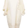 Cream bias-cut paneled linen-blend tunic shift featuring bateau neck, kimono sleeves, and cutout edge trim appliqué