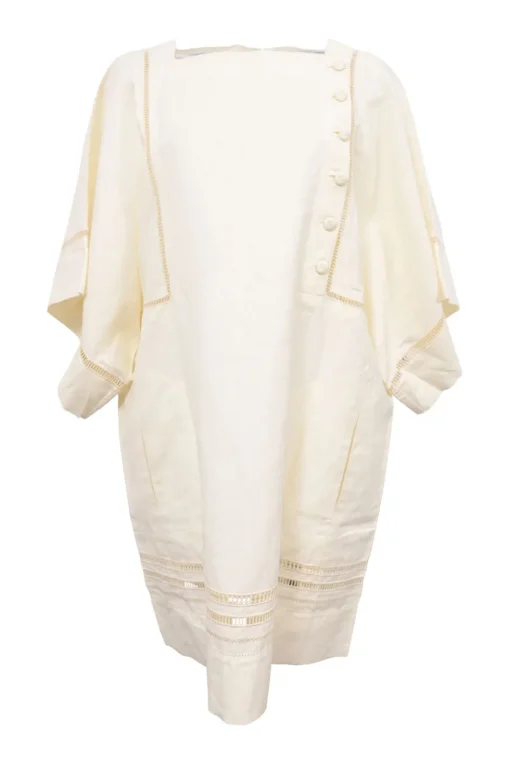 Cream bias-cut paneled linen-blend tunic shift featuring bateau neck, kimono sleeves, and cutout edge trim appliqué