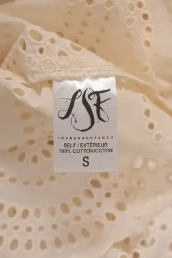 Cream cotton broderie Anglaise button-back long sleeve ruffled blouse