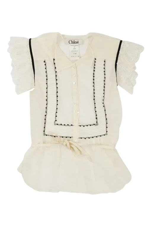 Cream cotton-silk plumette tulle spread collar pullover button-front tie-waist peplum top with flutter sleeves