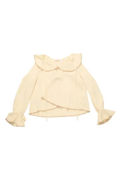 Cream draped polyester crêpe round collar bateau neck swing-style blouse with flounce cuffs