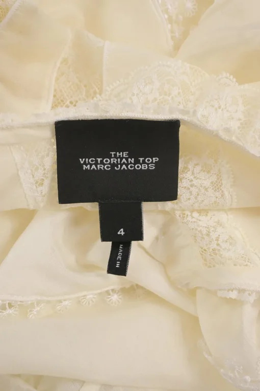Cream lace-trimmed BCI cotton-blend The Victorian flutter sleeve peplum blouse with drawstring waist