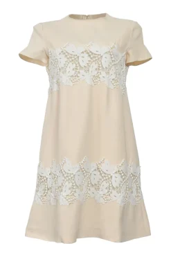 Cream silk-blend short sleeve swing-style hift dress with contrasting floral lace appliqué