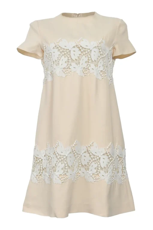 Cream silk-blend short sleeve swing-style hift dress with contrasting floral lace appliqué
