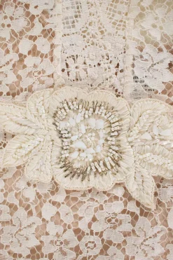 Cream sleeveless lace beaded top