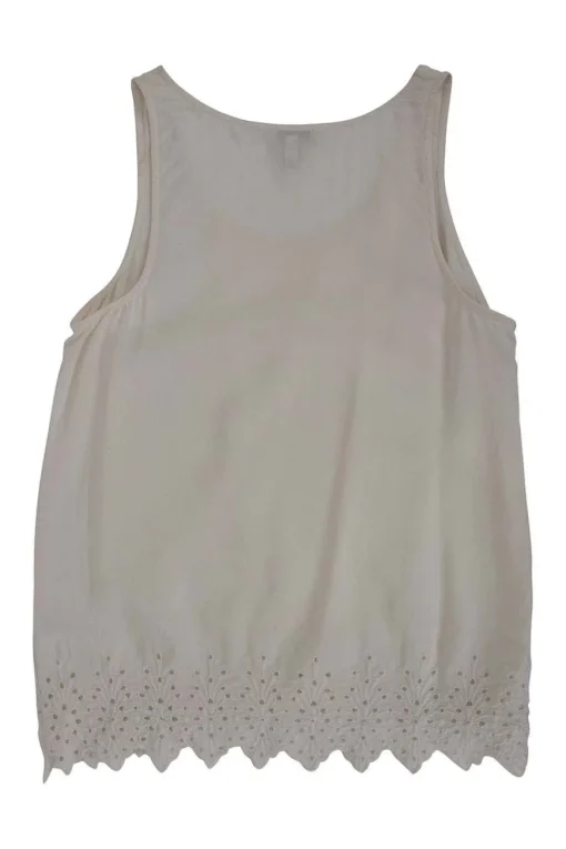 Cream sleeveless silk top with broderie hem