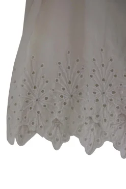 Cream sleeveless silk top with broderie hem