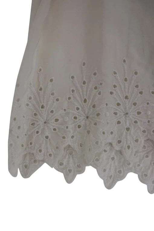 Cream sleeveless silk top with broderie hem