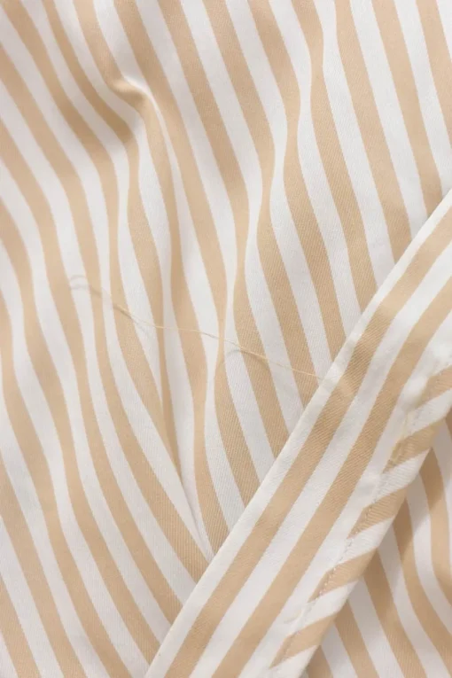 Cream striped cotton-blend Grecian neck drop-waist maxi dress with criss-cross back