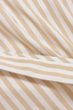 Cream striped cotton-blend Grecian neck drop-waist maxi dress with criss-cross back