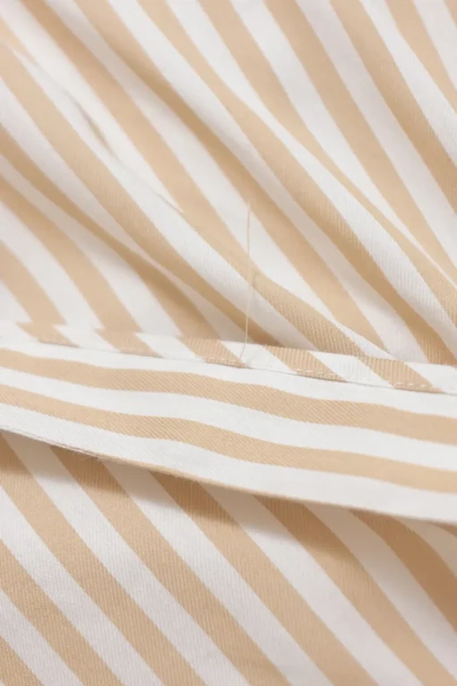 Cream striped cotton-blend Grecian neck drop-waist maxi dress with criss-cross back