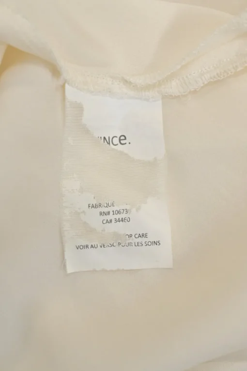 Cream Y-collar plunge neck pullover blouse with button tab sleeves