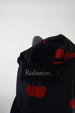 Dark navy and red wild cherry print Teale short sleeve plunge wrap dress